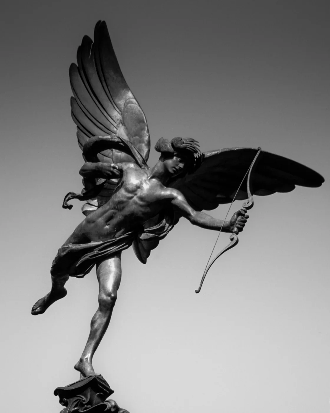 The bronze statue at the top of the Shaftesbury Memorial in Piccadilly Circus, London - an angel with bow drawn, often called Eros but in fact depicting Anteros.